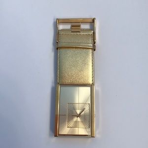 Nixon gold large gold face watch